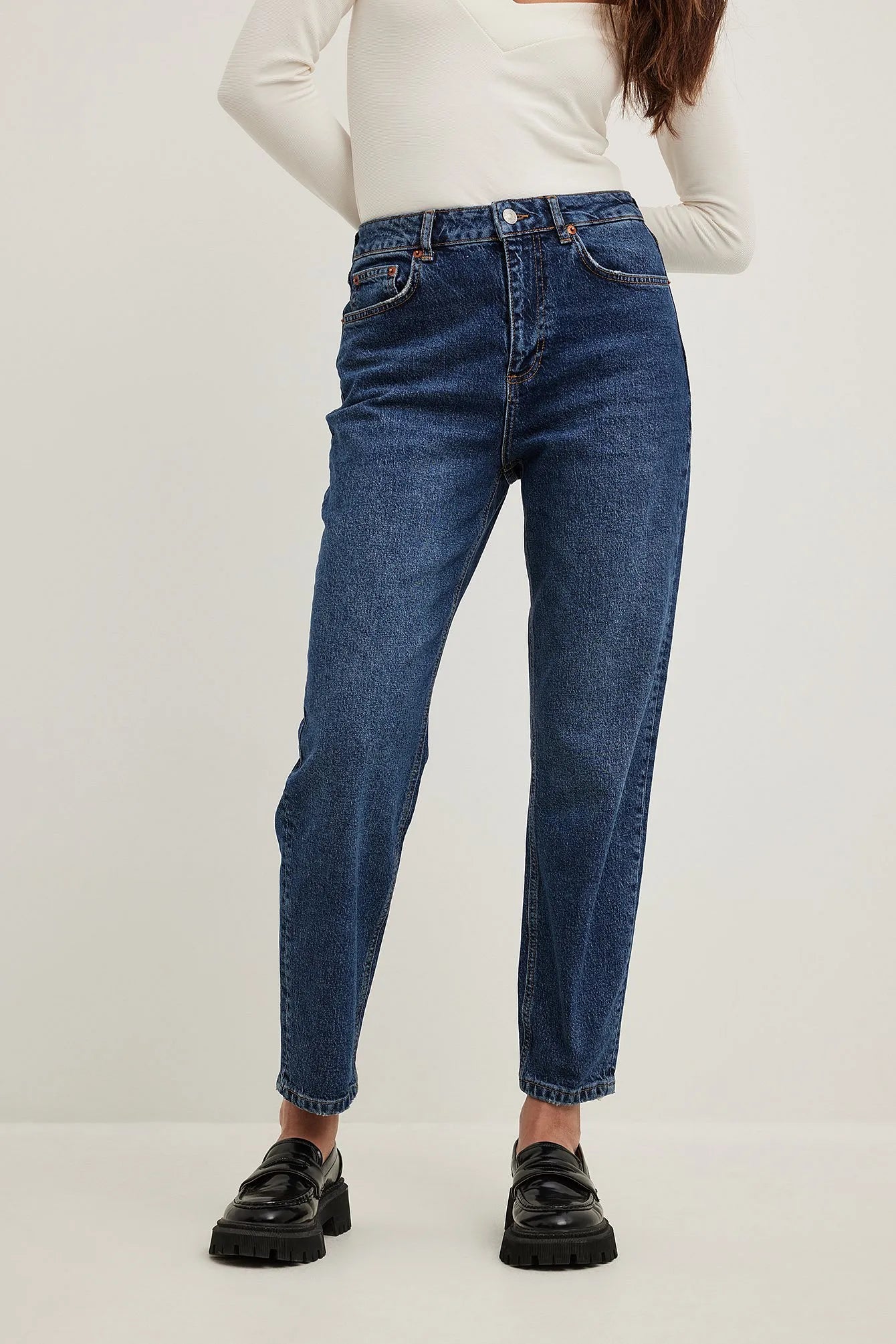 Close-Up of the High-Rise Waist on Mid Blue Mom Jeans
